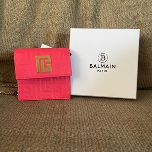 Brand new never used BALMAIN TINY BAG WITH GOLD CROSSBODY CHAIN